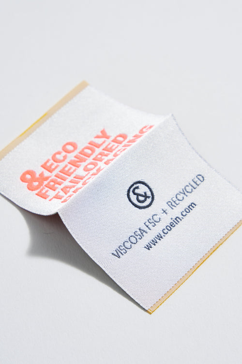 Woven saddle-stitch label - 2